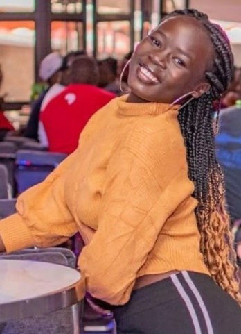 Kenya OnlyFans Models sexy photo - Melanin Queen - @u182676998 wearing a sweater.