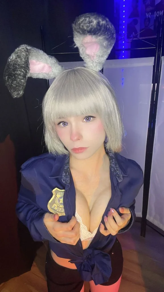 Mei Kitsune OnlyFans gamer girl in an alluring outfit that shows her boobs